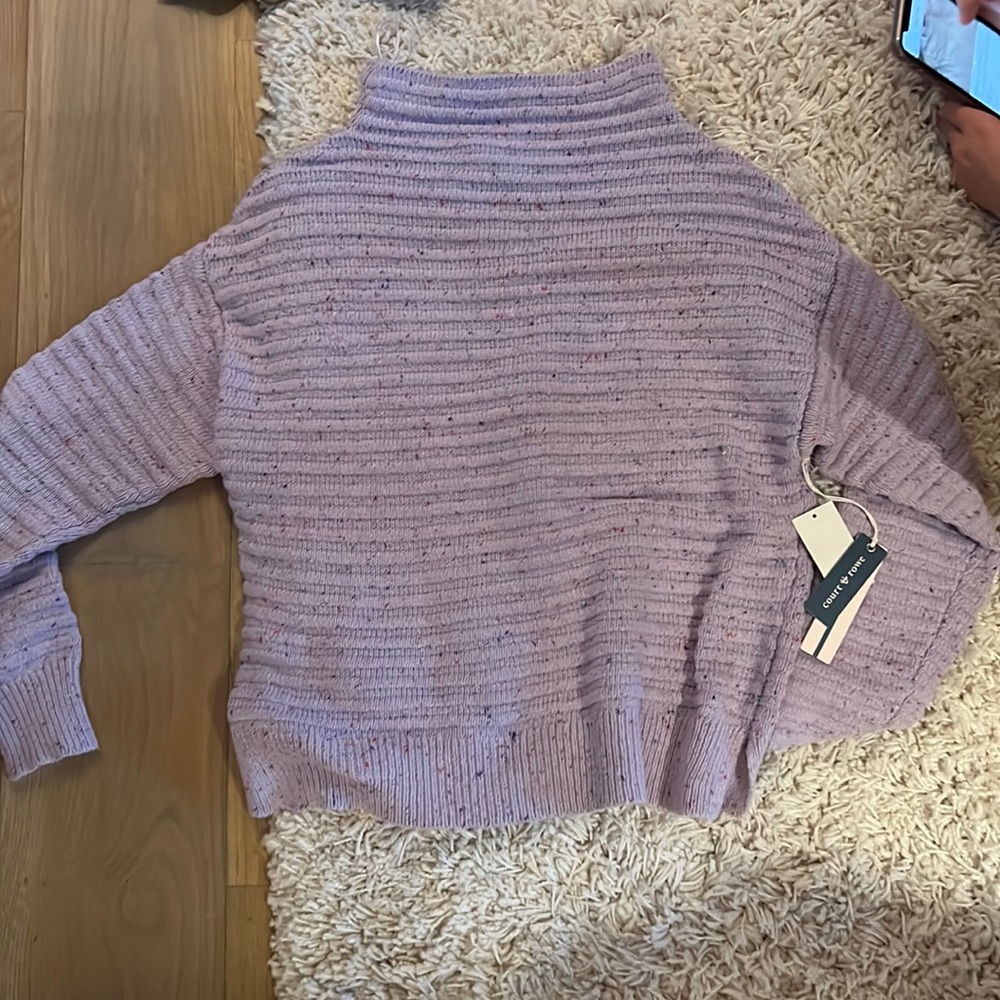 Purple sweater with small turtle neck some spot designs never worn